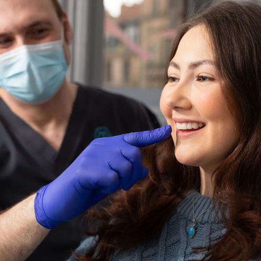 Patient having an appointment for periodontal treatment in London
